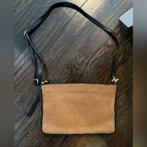 Cross body (one side is like brown calf hair, the other side is black leather)
